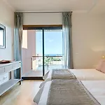 Sunset Village - &